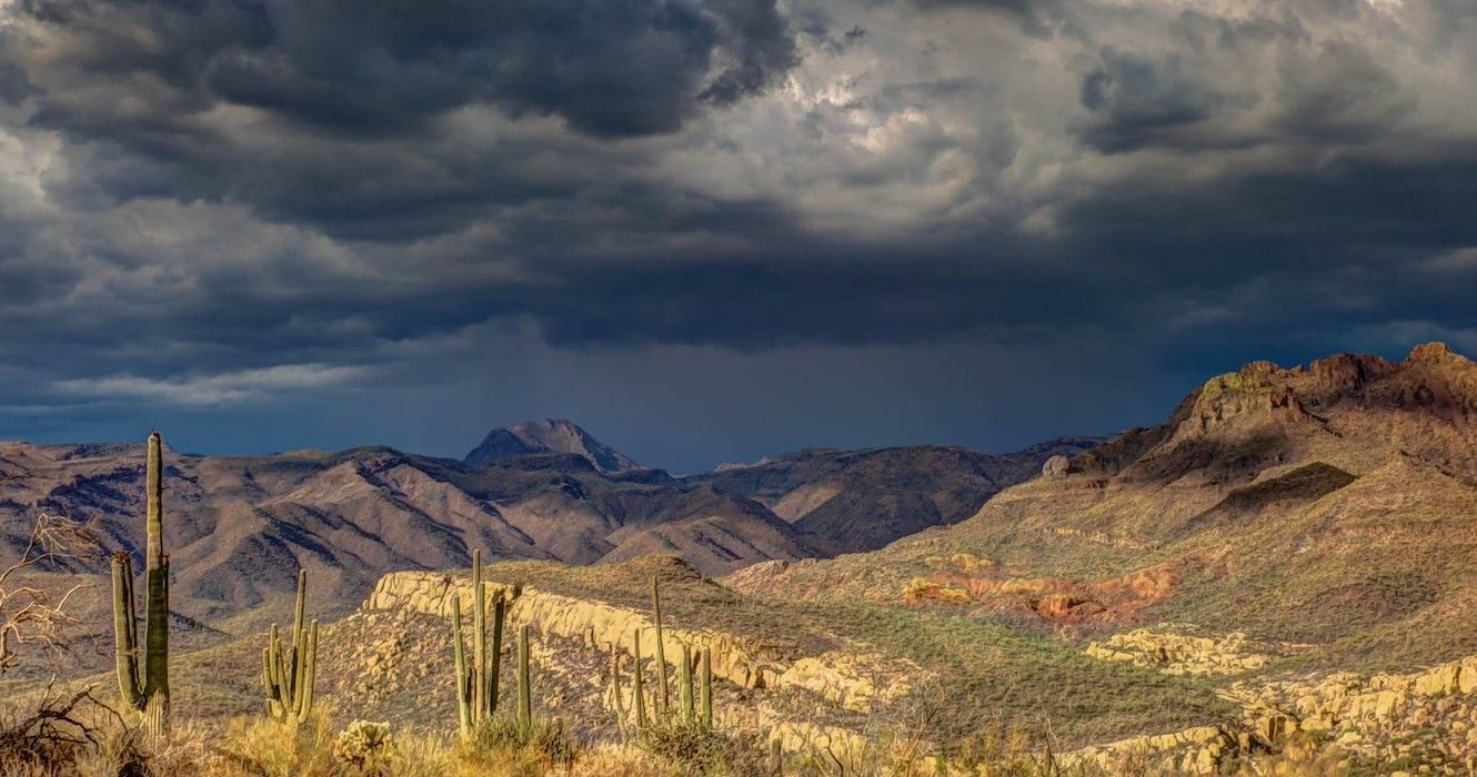 Mesa desert scape with dark clouds