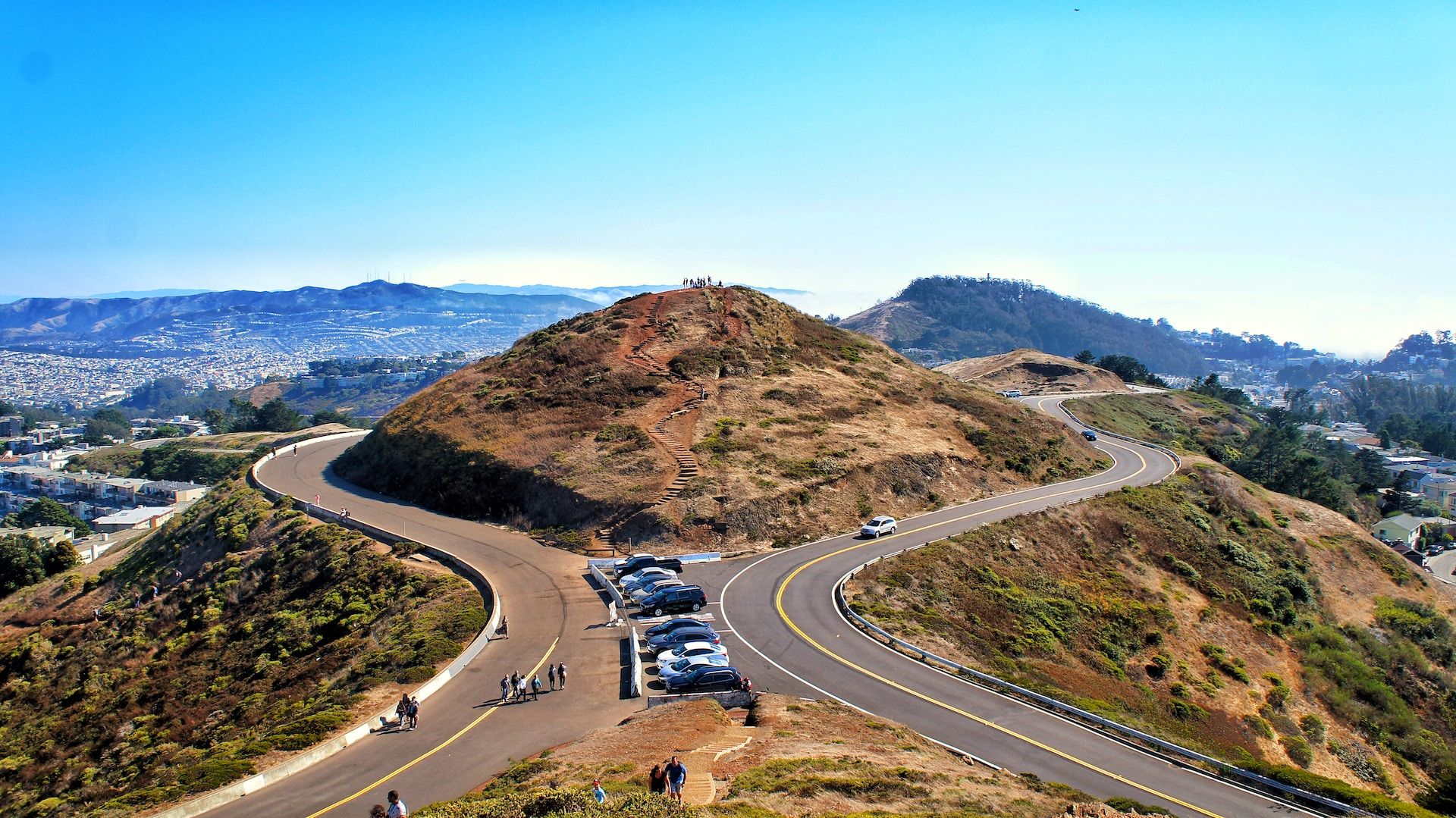 View of one of two hills at Twin Peaks and parked cars, San Francisco, California 