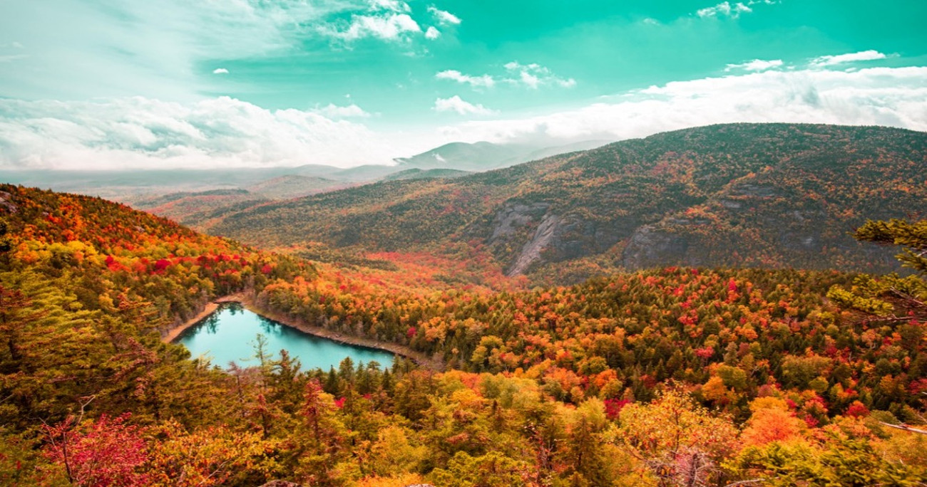The Adirondack Mountains in New York in the fall, showcasing beautiful fall foliage colors