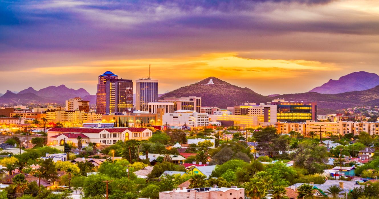 Tucson, Arizona, USA downtown skyline and Sentinel Peak at dusk.