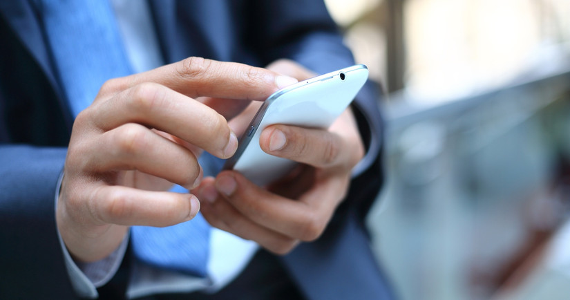 Person holding cell phone