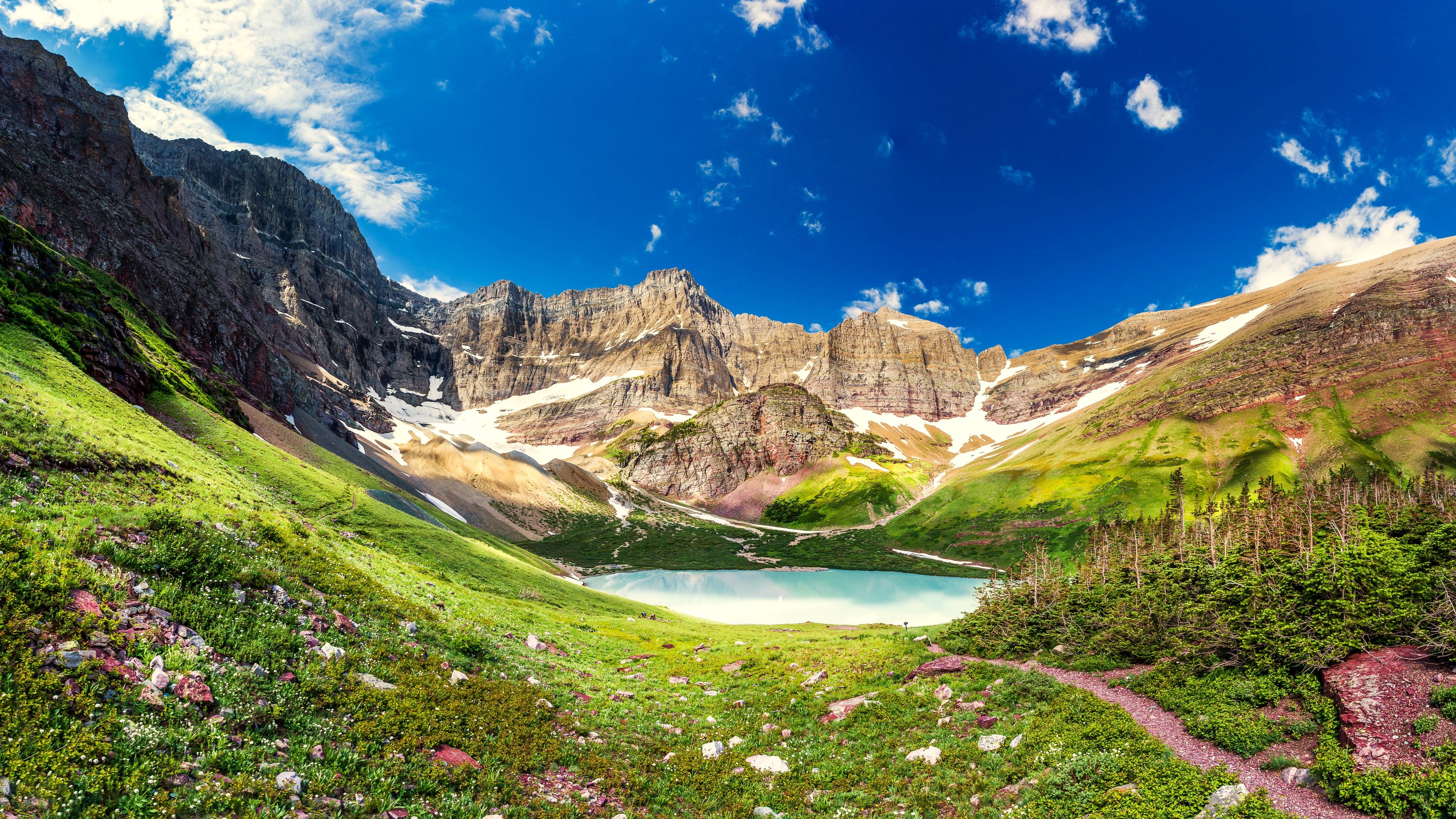 This Is Glacier National Park's Largest Lake (& It's Worth The Hike)