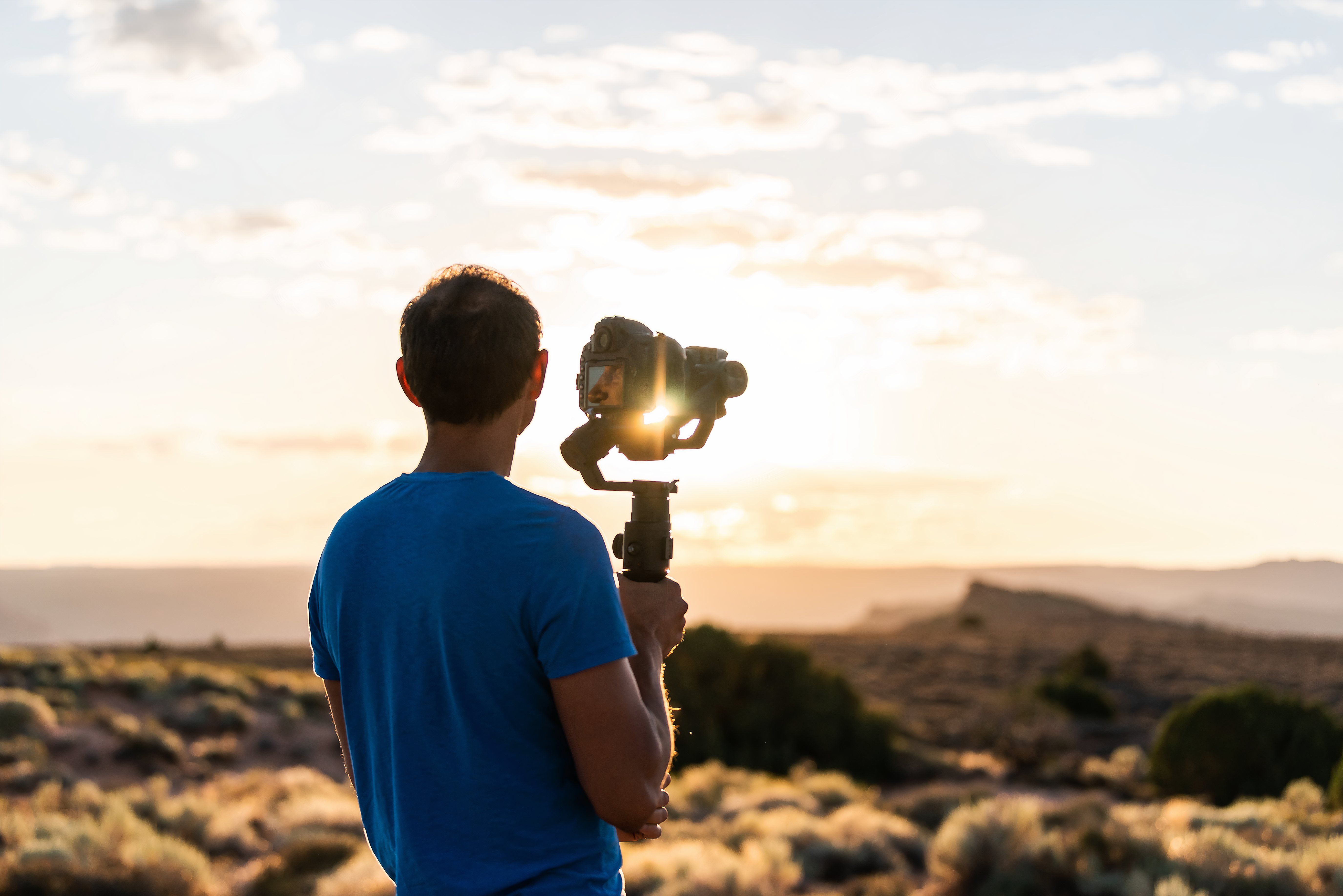 Man with camera in Arches National Park, Utah 