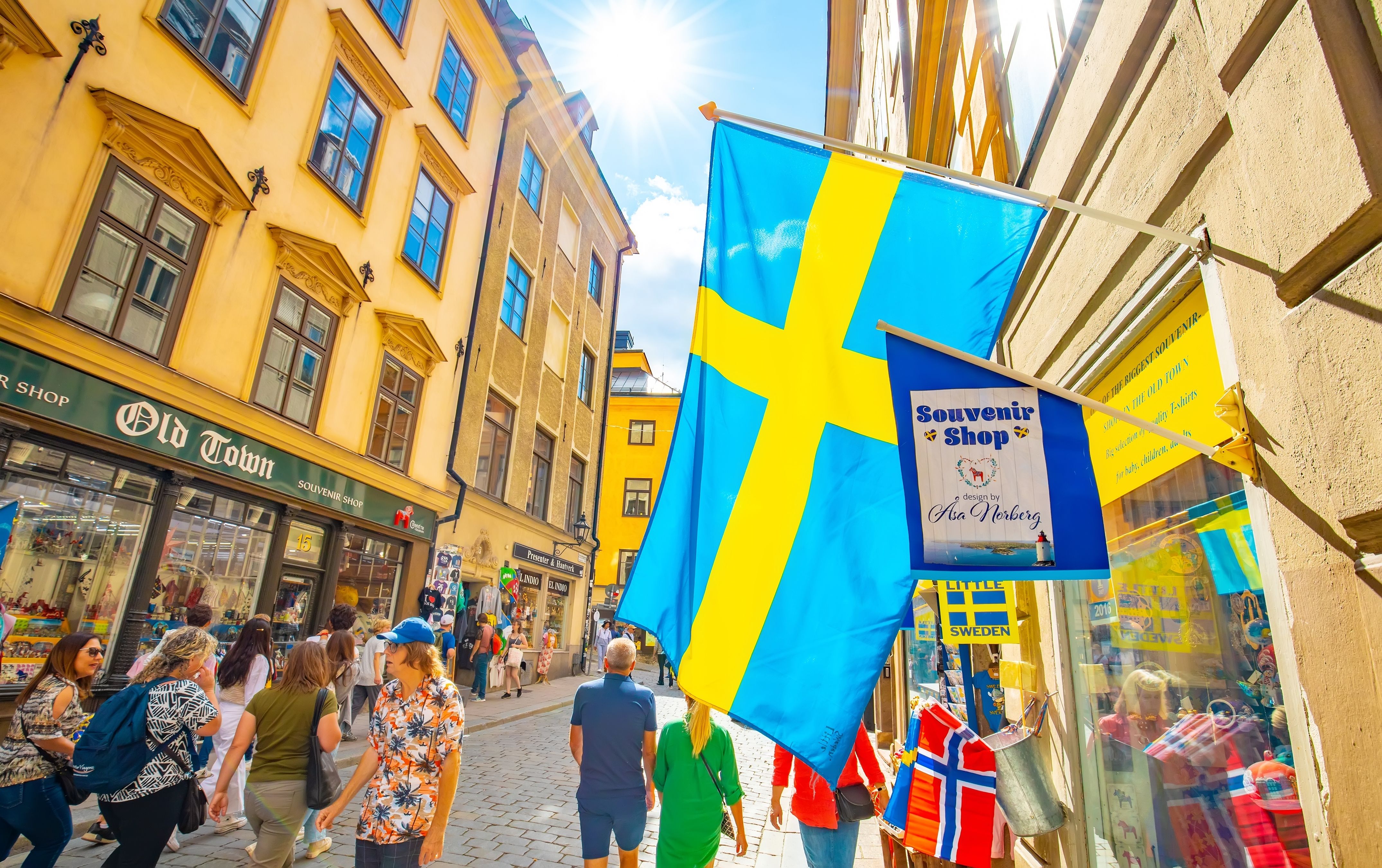 Stockholm, Sweden - 19 May, 2024 - Busy tourist street Västerlånggatan (or Vasterlanggatan) with souvenir shops in Stockholm old town, Gamla Stan district. Swedish travel photo of capital city.