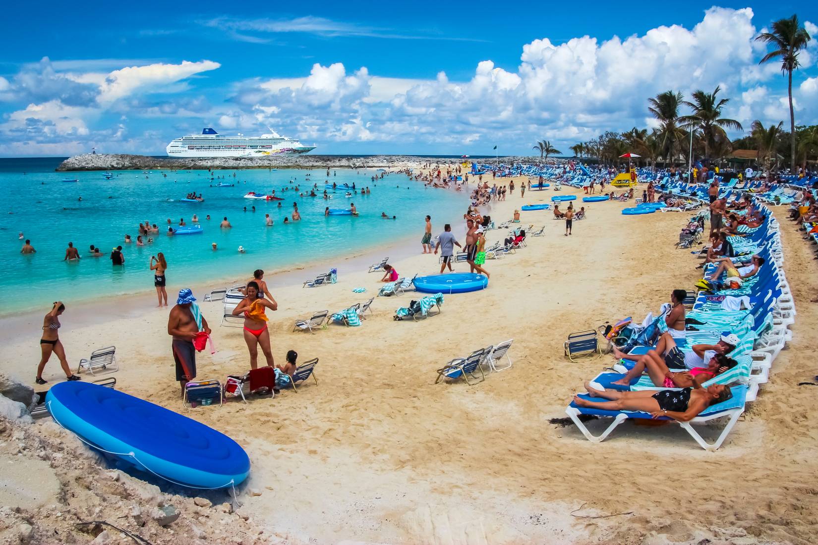 People enjoying the beach at Great Stirrup Cay, Bahamas