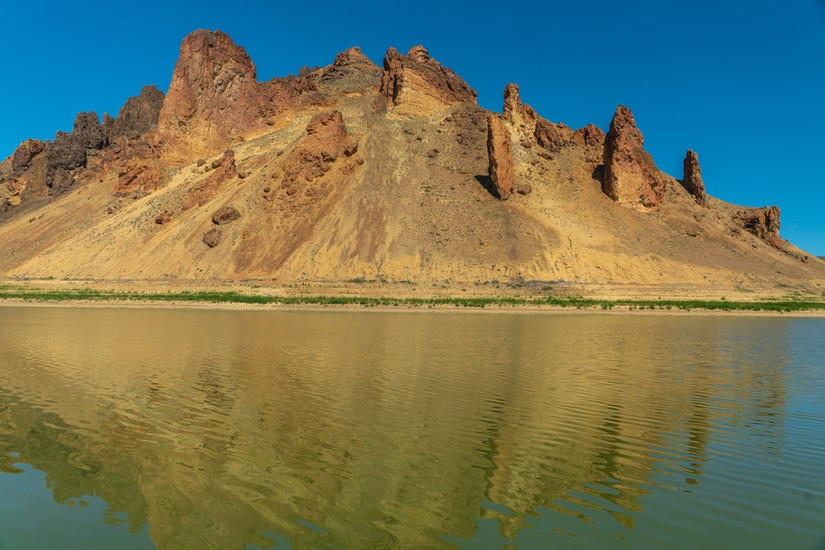  Reflection of Spires Pillars Peaks in Water, Owyhee Canyonlands at Leslie Gulch, Oregon