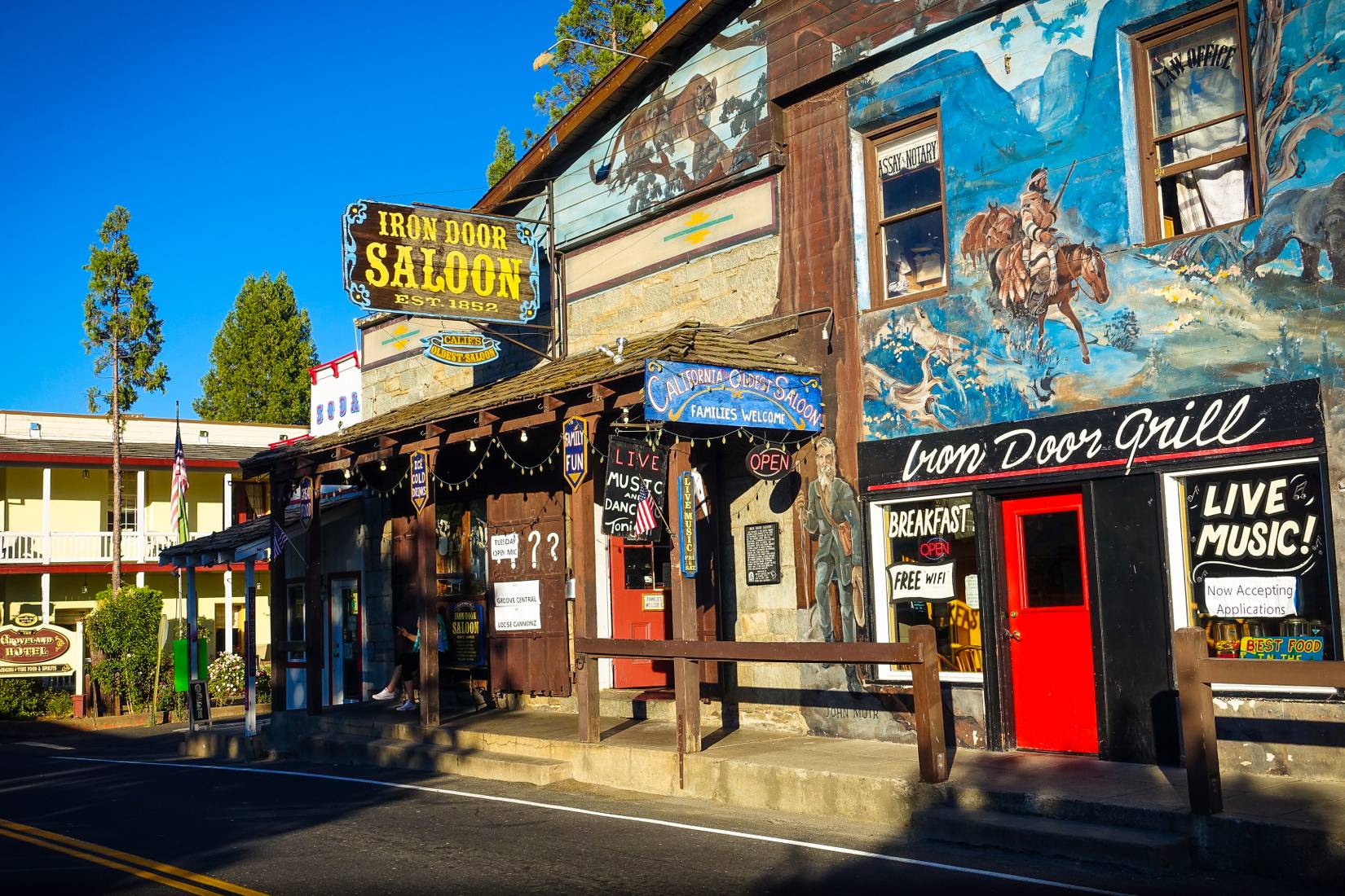 The Iron Door Saloon and other historic buildings in downtown Groveland, California 