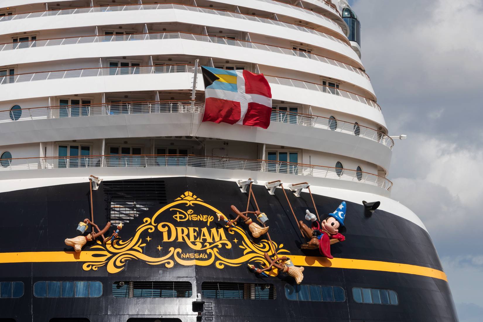 The rear section of the Disney Dream at the Ostseekai with lettering and Disney characters