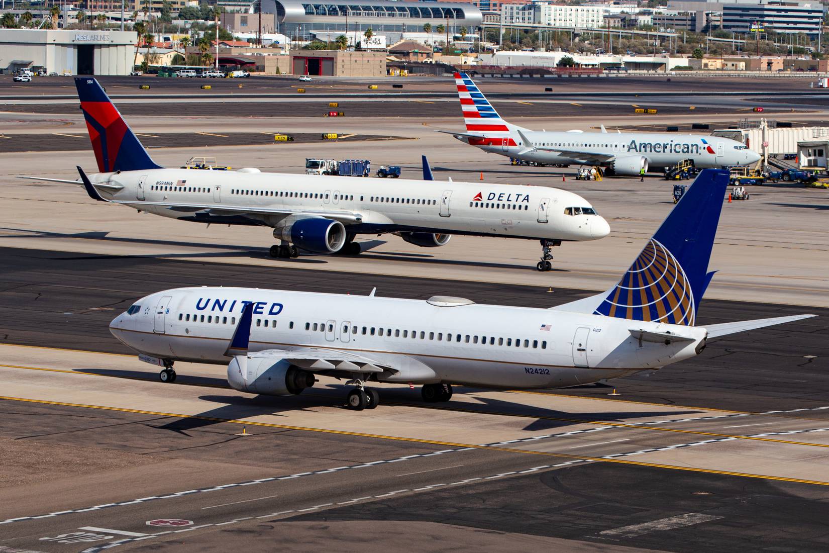 View of United, Delta, and American Airlines passenger planes
