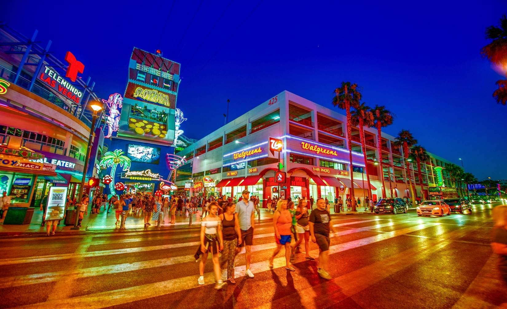 Tourists in downtown Las Vegas at night, Nevada, NV, USA