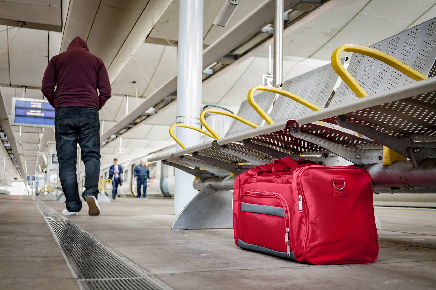 Terrorism and public safety concept with an unattended bag at the airport