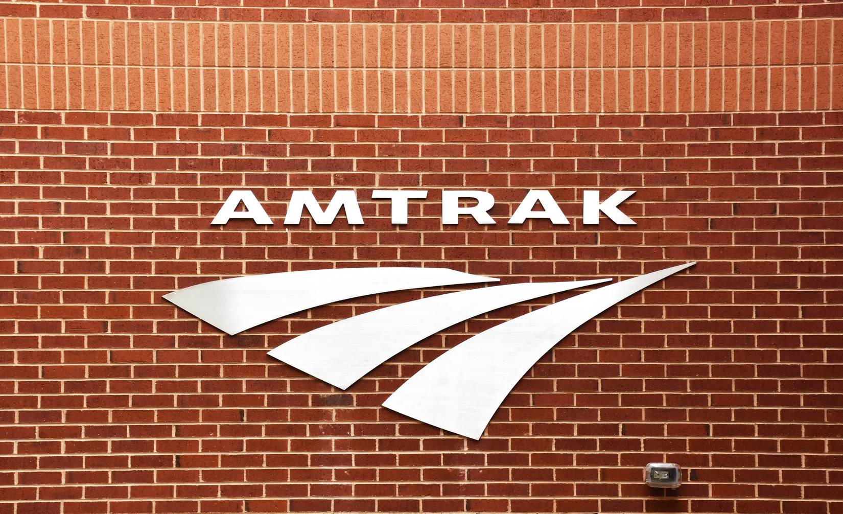 Amtrak Sign on brick wall, in Cary, North Carolina Train Station