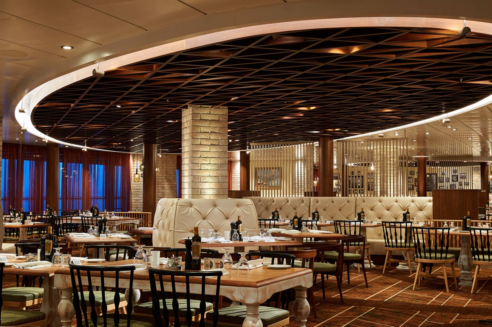 A restaurant on board the Carnival Encounter cruise ship