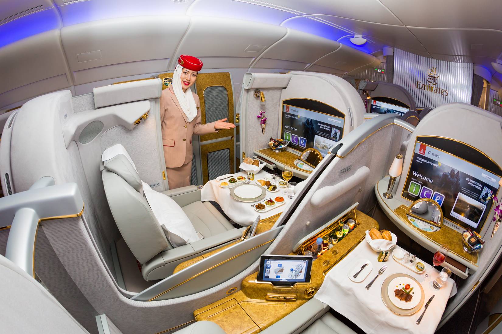 Emirates Airline flight attendant in Emirates first class