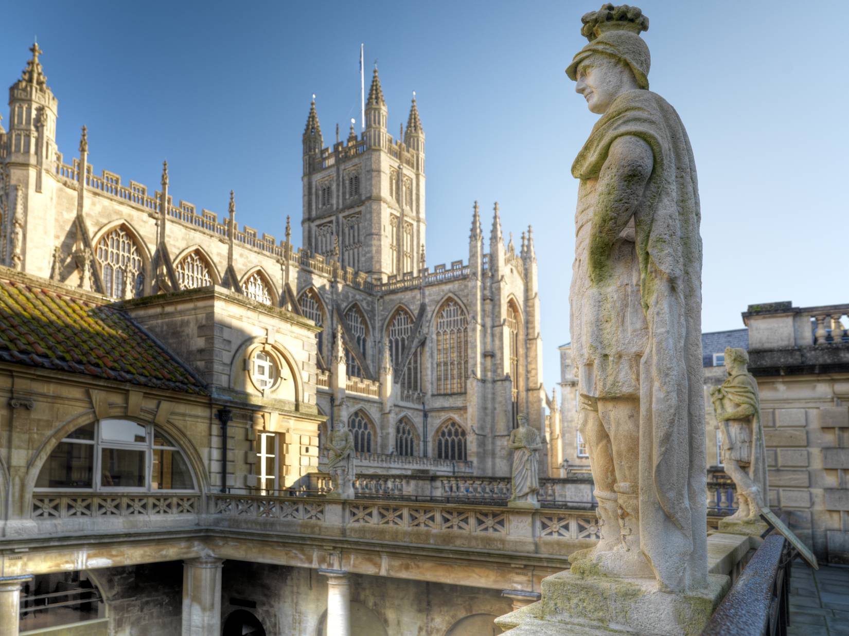 Roman Baths balcony with Bath Abbey in the background - Credit Visit Bath