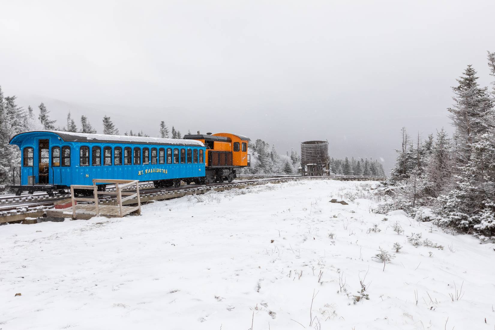 New Hampshire's Mount Washington Cog Railway climbing up the summit in winter