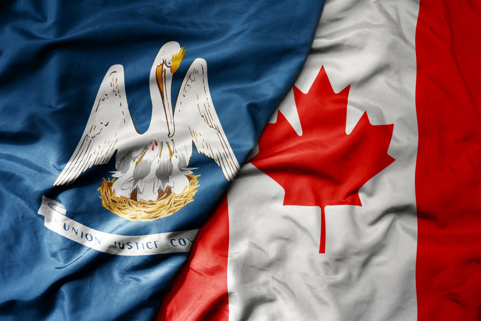 State flag of Louisiana and flag of Canada