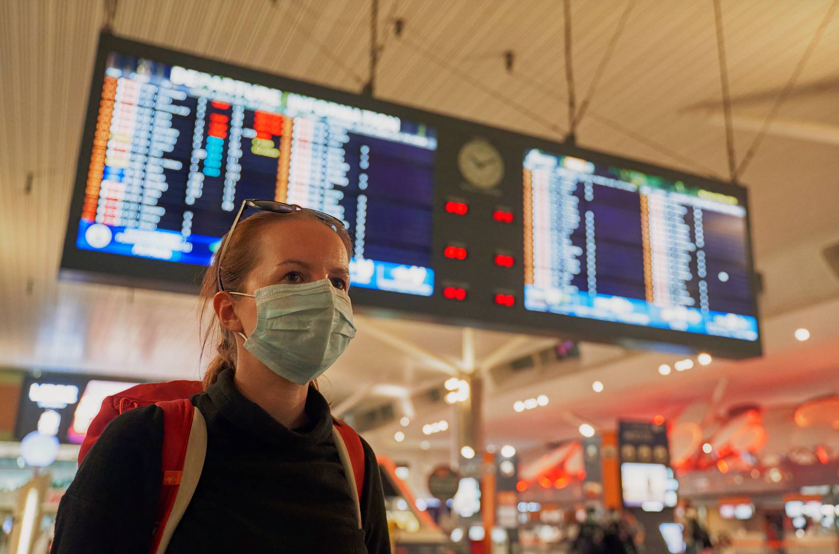 Traveler Wearing Mask In Airport