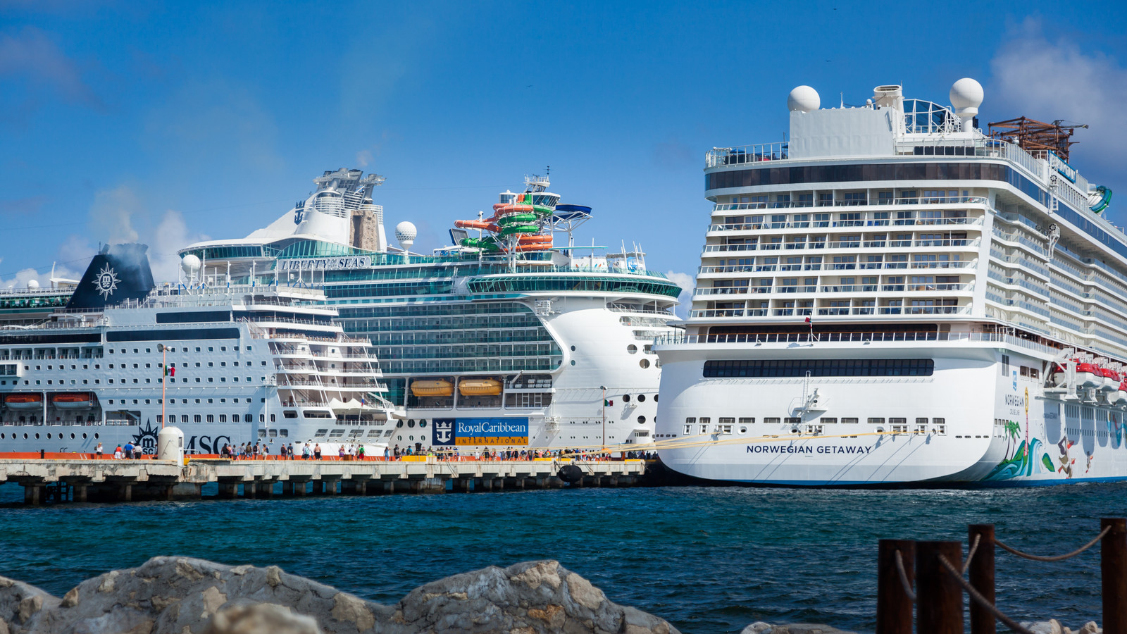 Royal Caribbean Keeps Quiet While Norwegian Cruise Line Issues Warning Over New Cruise Tax That Was Upheld In Court