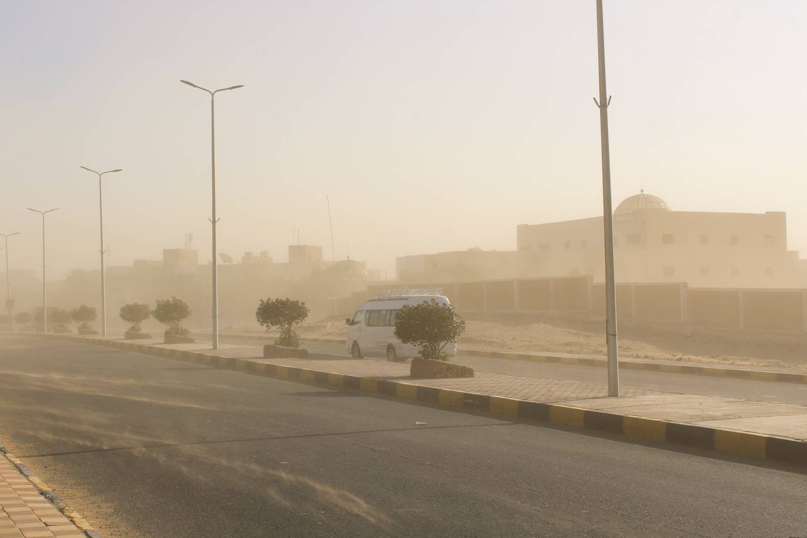 Dust storm on a street of the city of Hurghada, Egypt