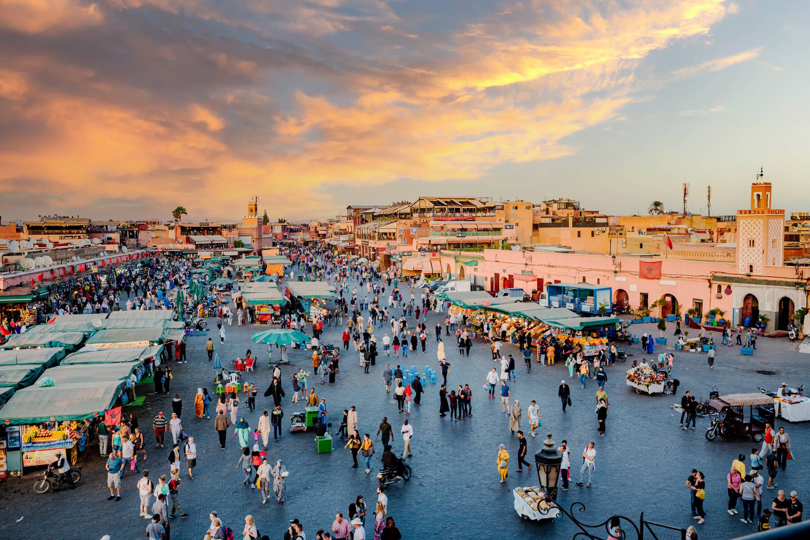 City square market crowded with people in Marrakesh, Morocco