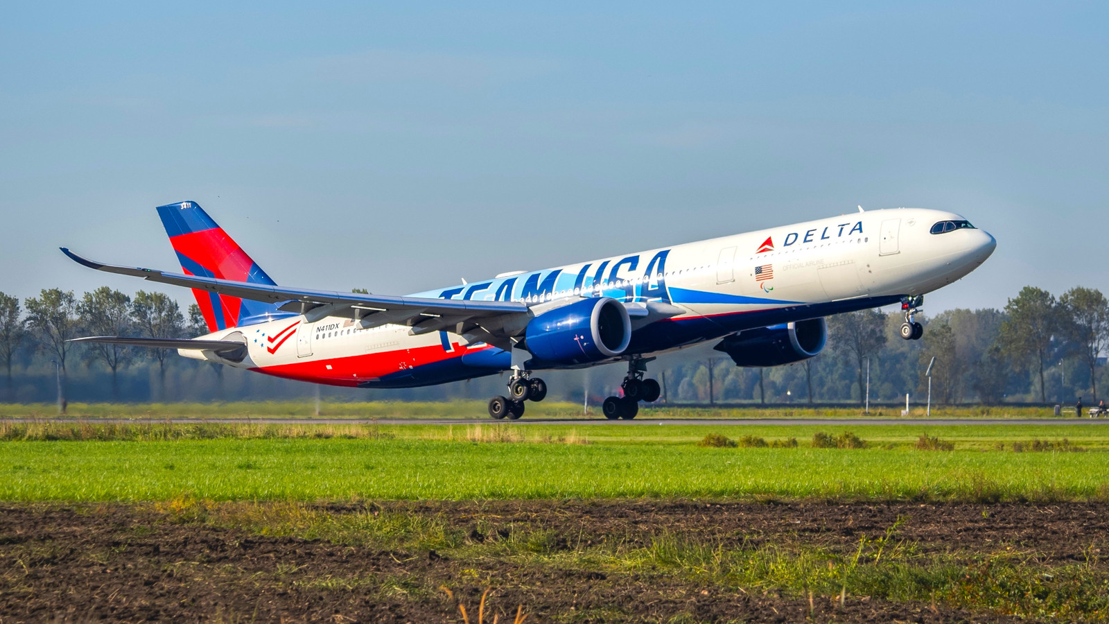 Delta Air Lines' "Team USA" Flight Met By Firefighters Again As Same Plane Suffers Second Incident In Two Months