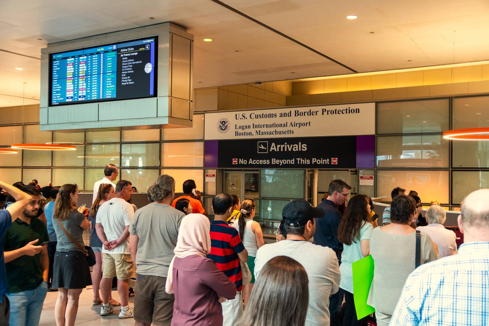 Interior of the arrivals hall and the U.S. Customs and Border Protection exit at Boston Logan International Airport in Boston, Massachusetts, MA, USA
