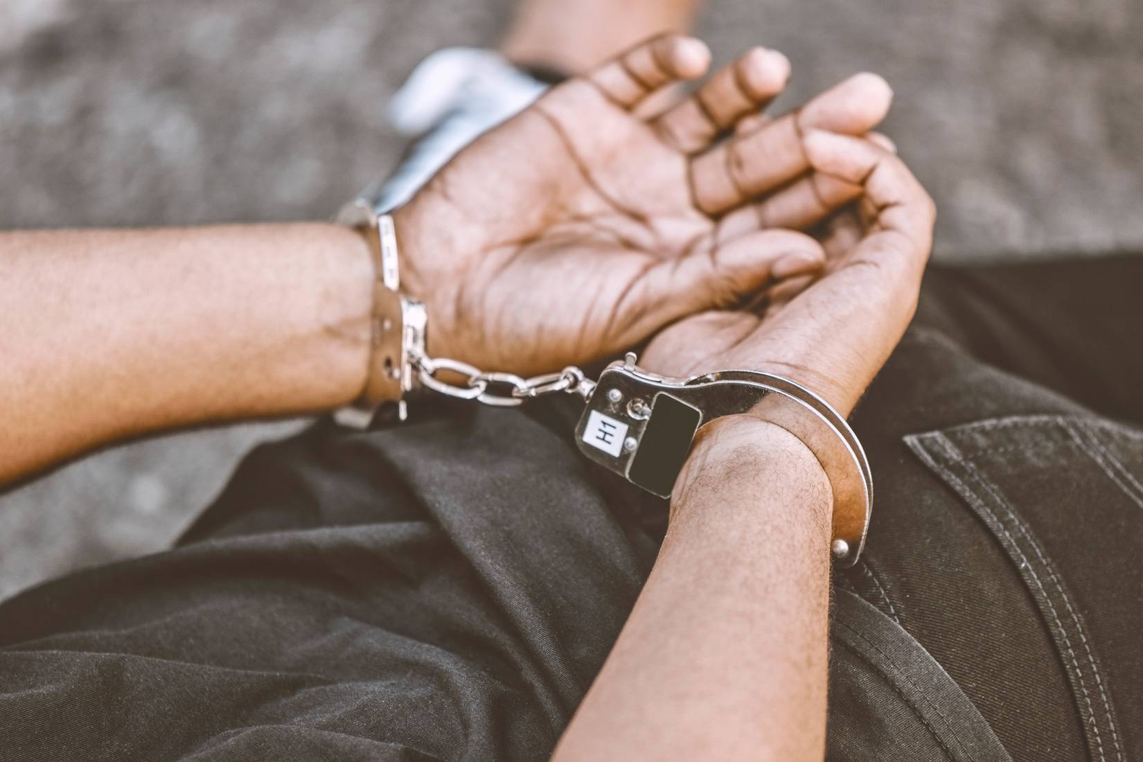 Person in handcuffs, Venezuela