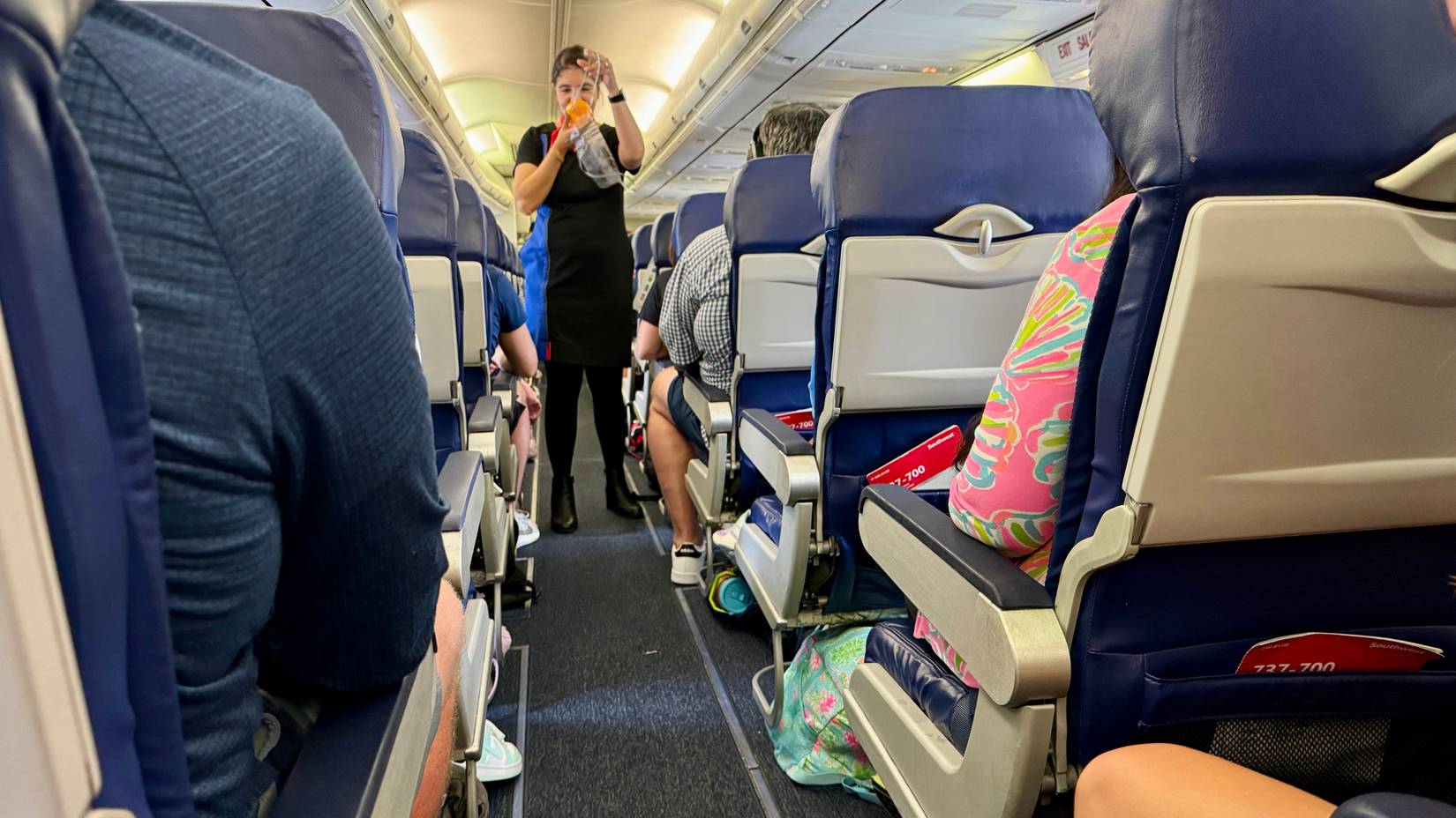 Passengers seated on a Southwest Airlines airplane in the cabin