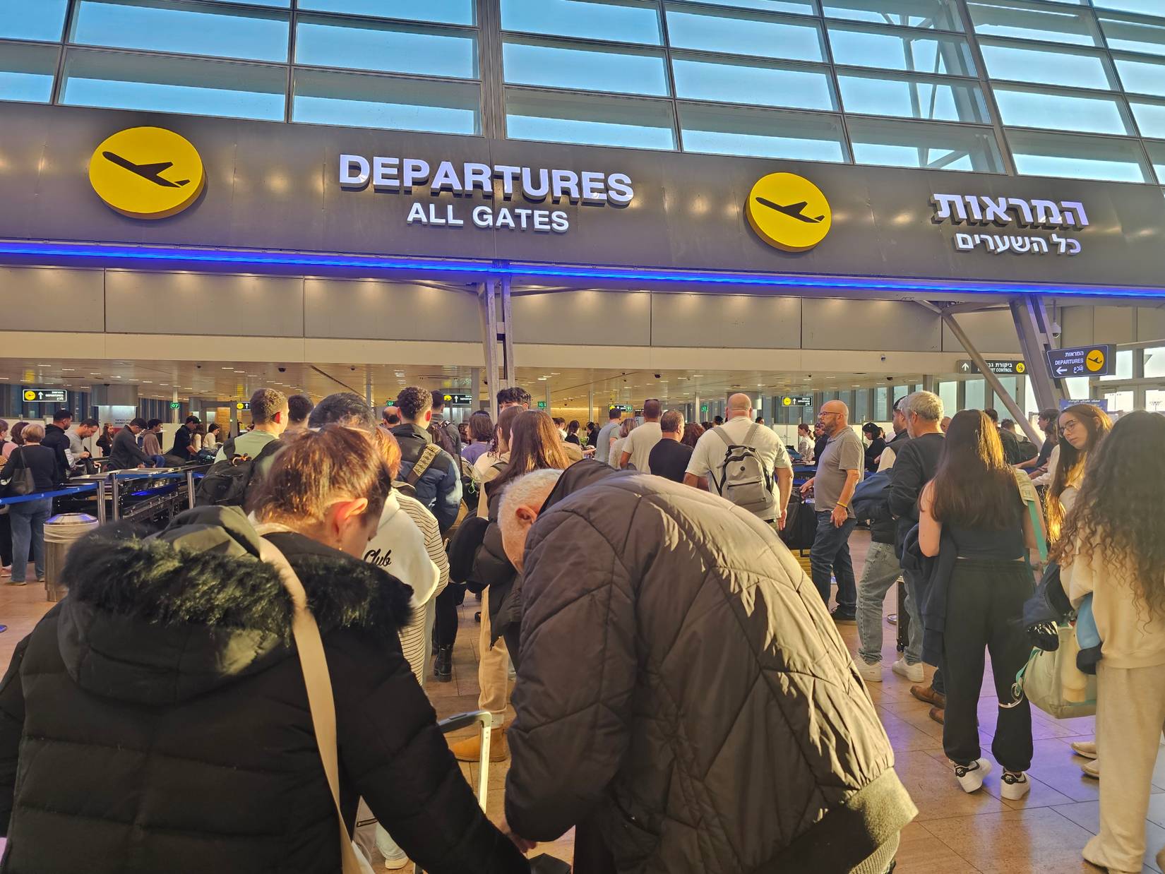 Passengers waiting in line for security check before departure in Lod, Ben Gurion Airport, Israel