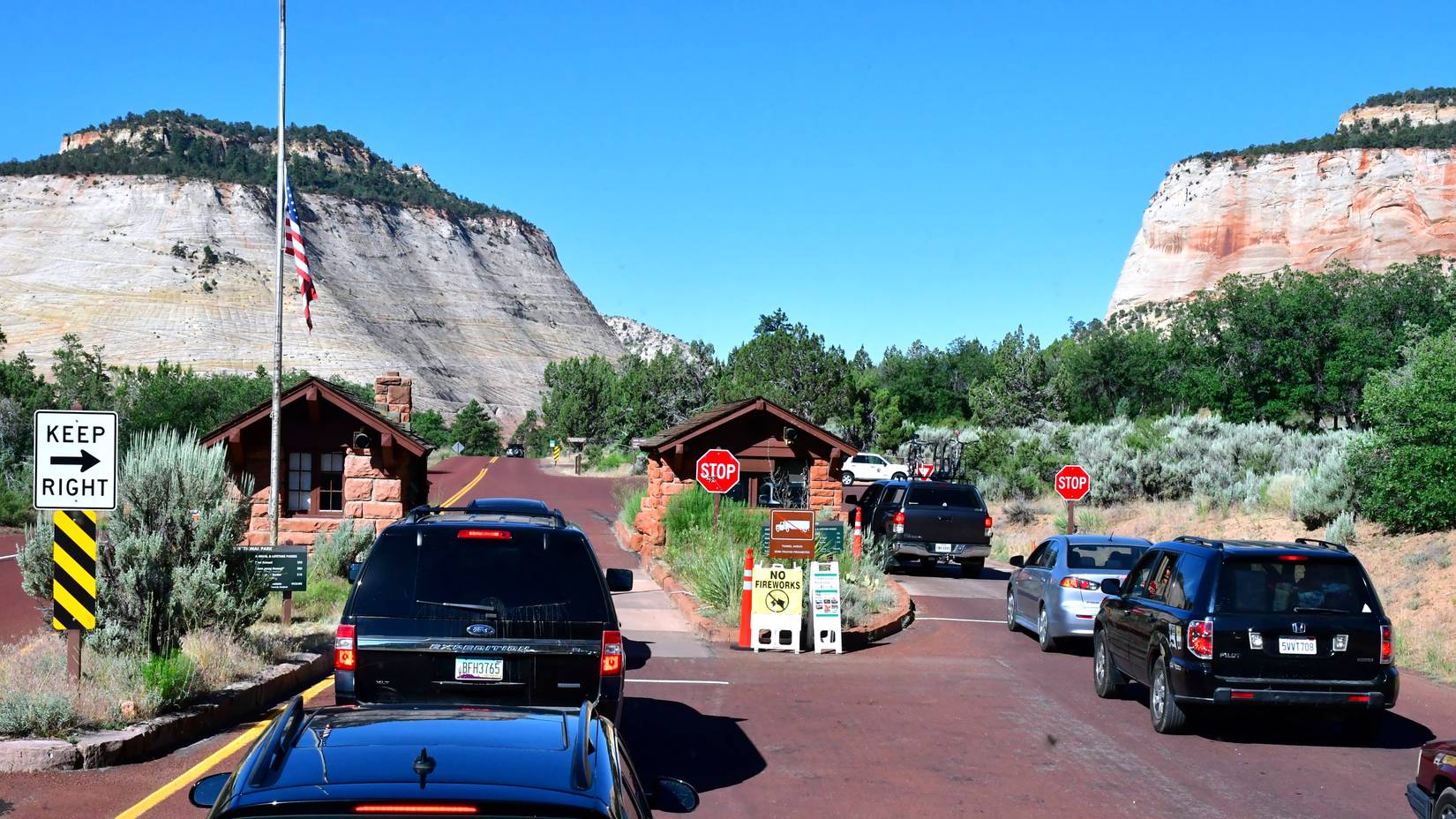 View of the entrance of Zion National Park in Utah, with cars lining up to enter the park