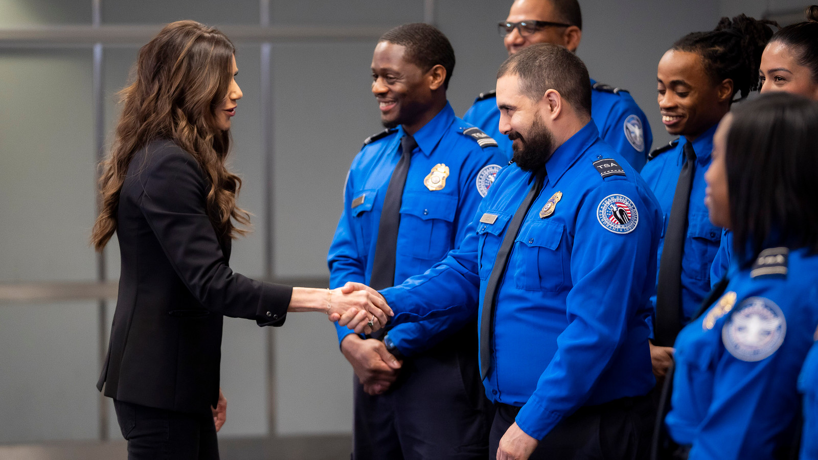 Homeland Security Secretary's Praise For Unpaid TSA Employees Backfires As Americans Chant "Abolish ICE"