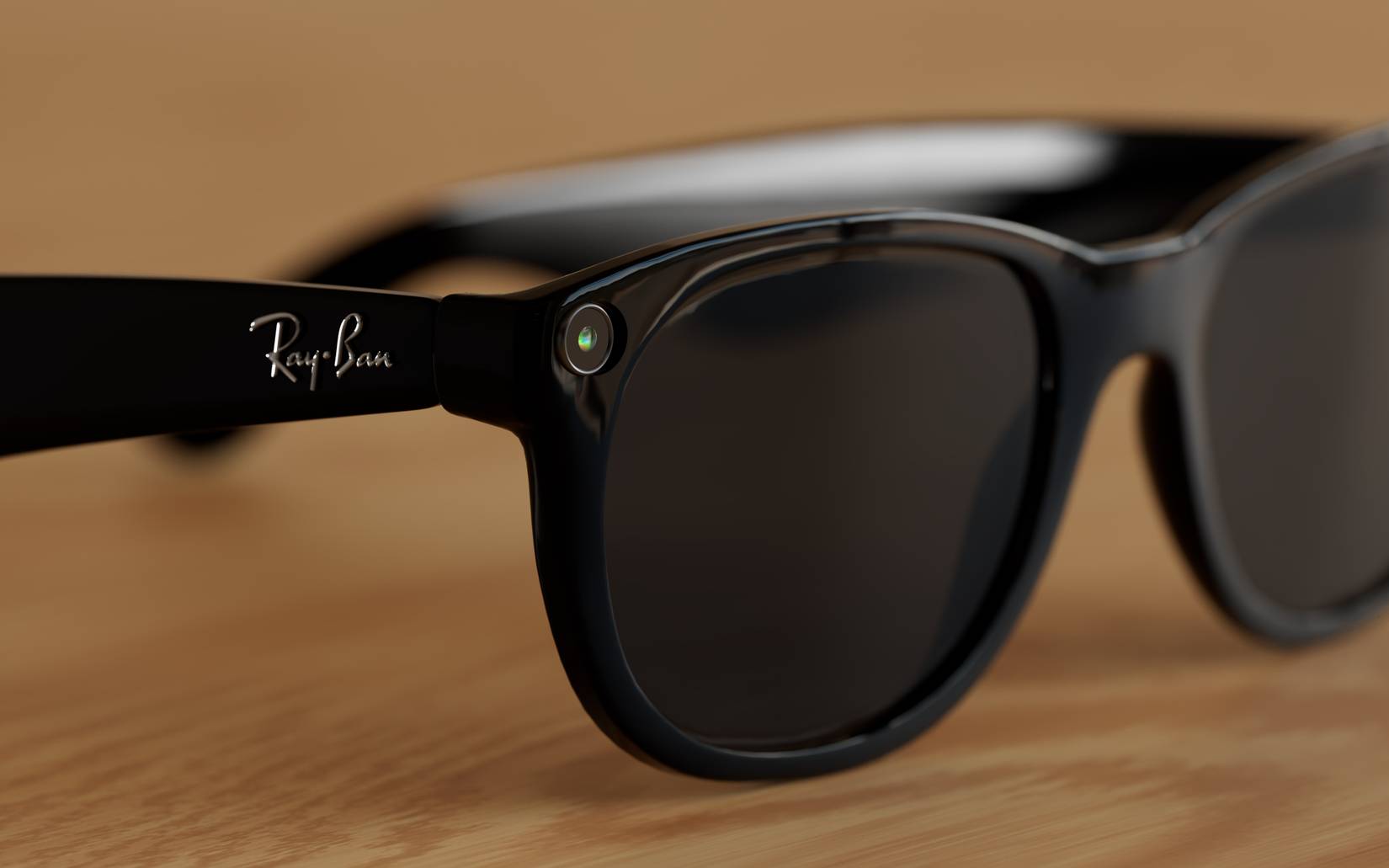 Close-up of the Meta Glasses with the Ray-Ban logo and the built-in ultra-wide 12 MP camera.