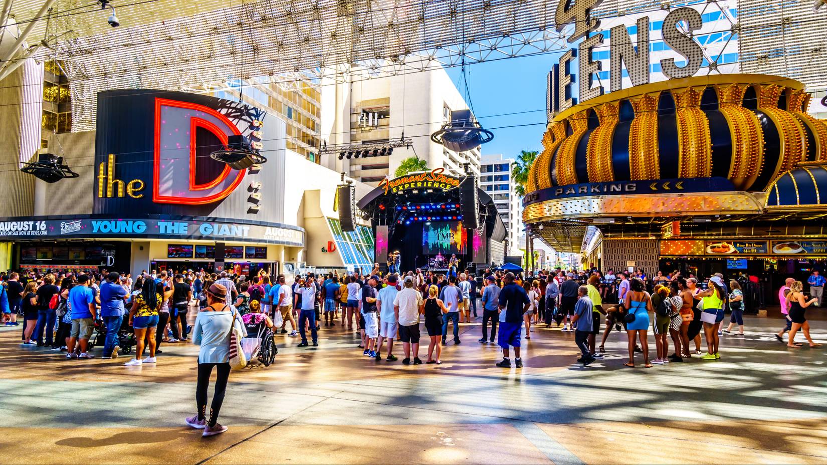 Hustle and bustle of crowds during the day on the famous Fremont Street in the heart of downtown Las Vegas