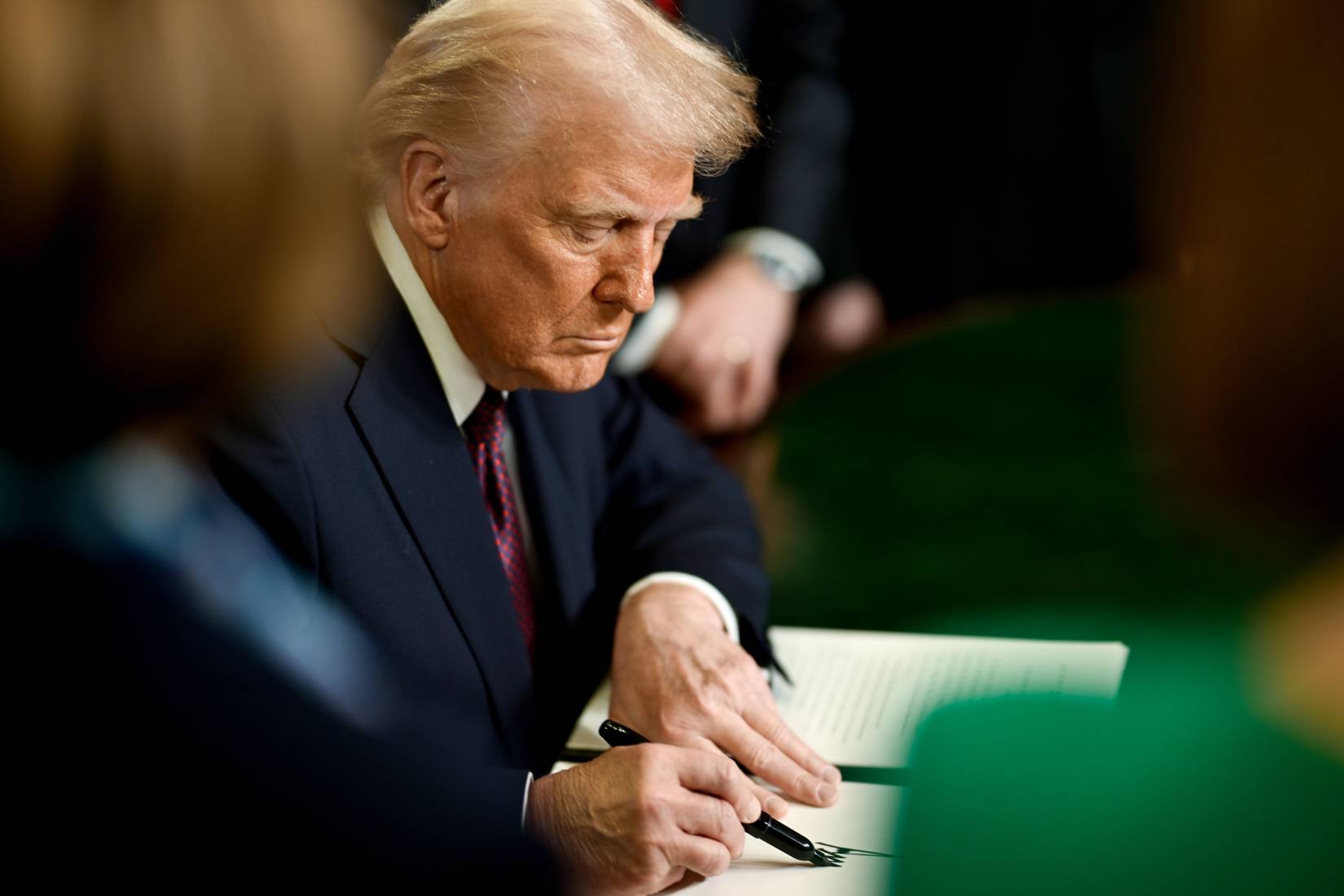 President Donald J. Trump signing an executive order