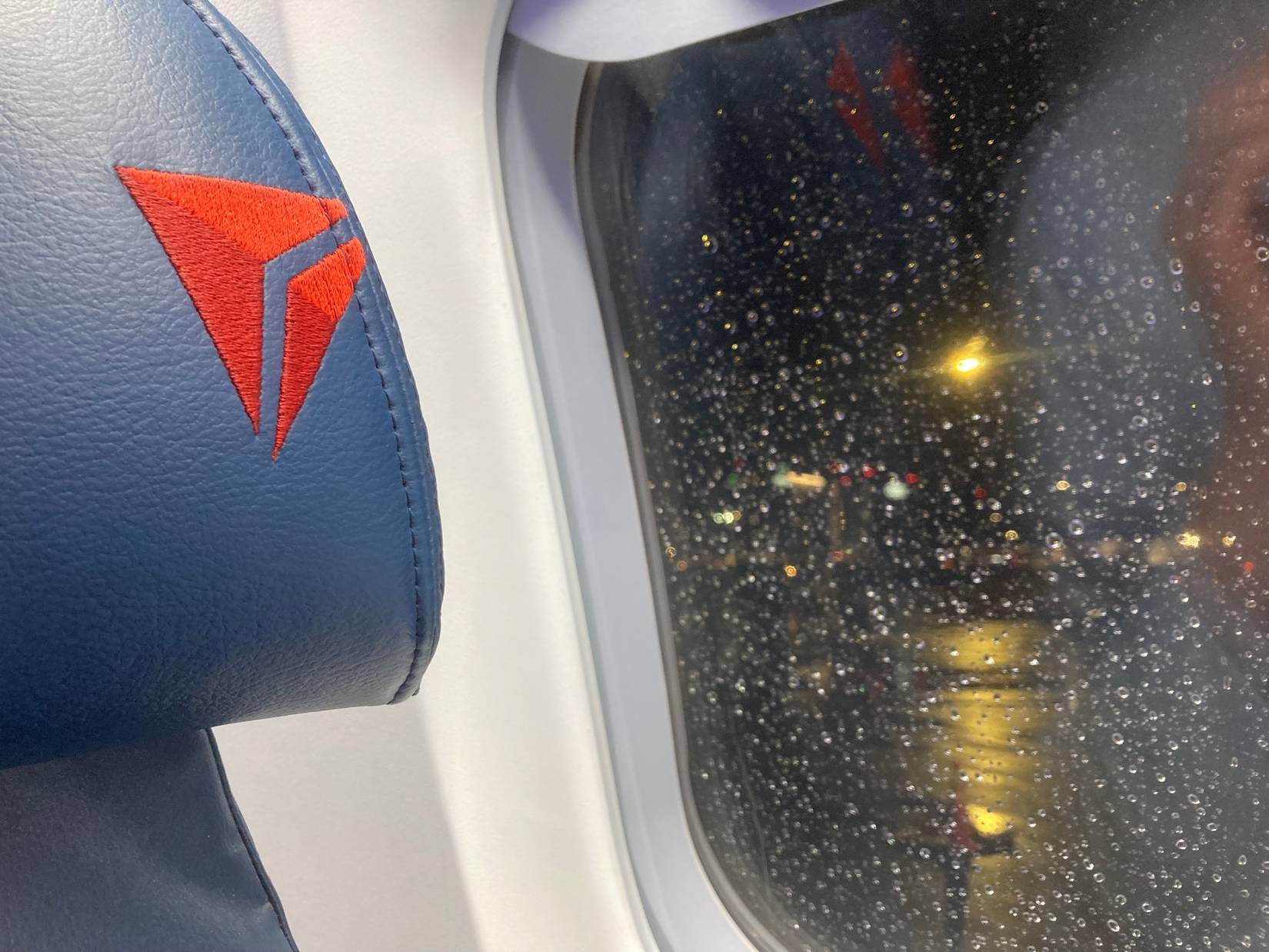 Delta Air Lines seat on flight with no passengers.