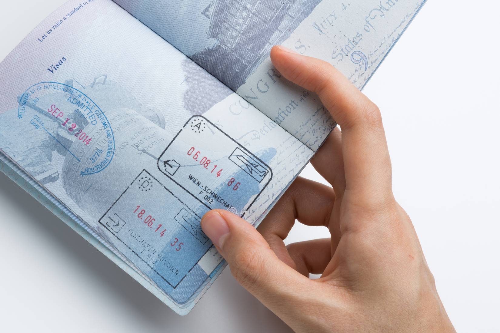 Inside of American Passport with Departure Arrival Stamps