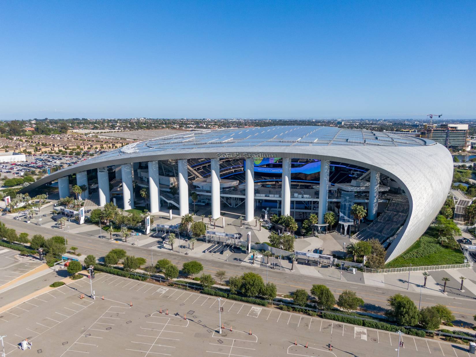 Aerial drone shot of SoFi Stadium in Los Angeles, California, one of the venues for the 2026 FIFA World Cup.