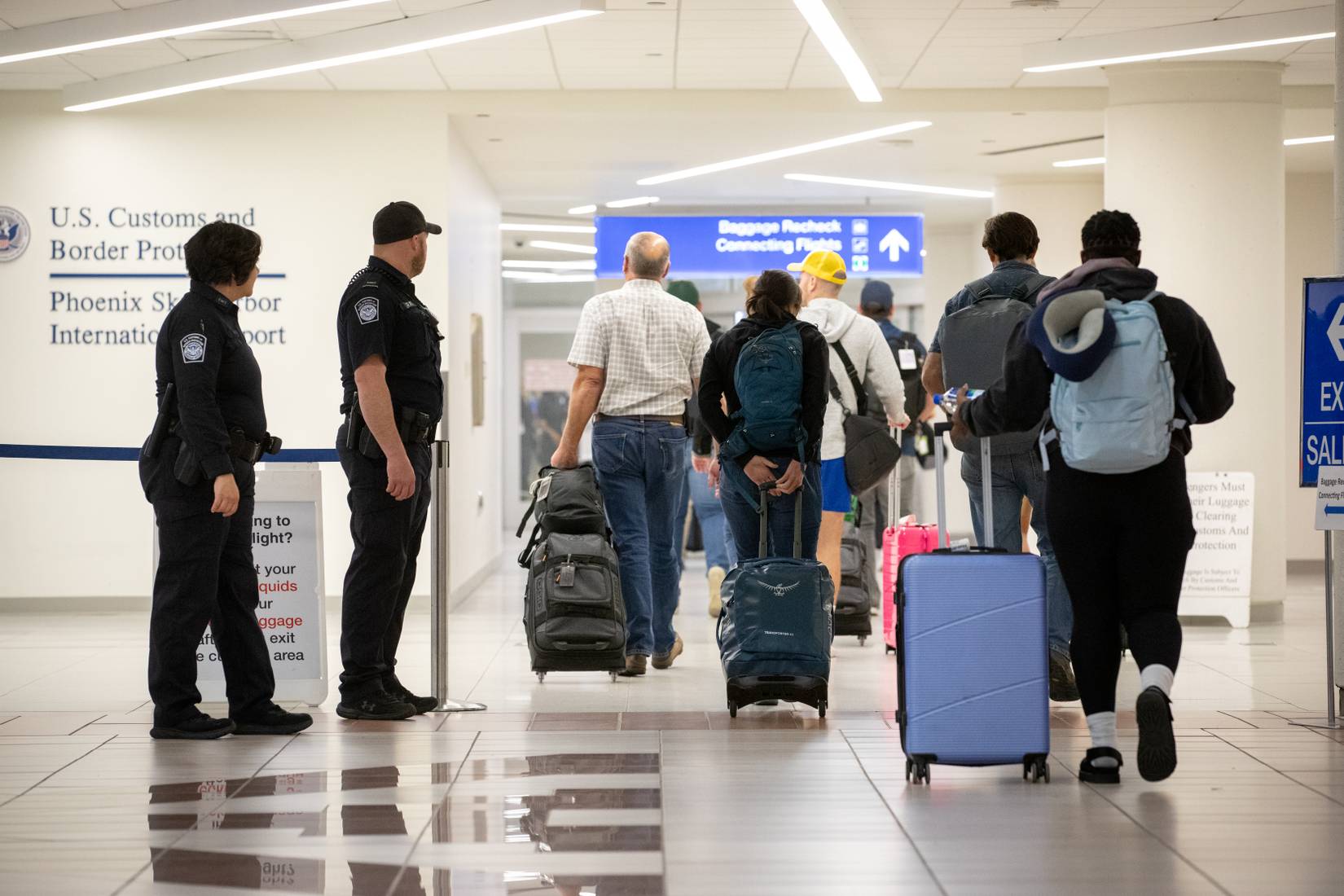 U.S. Customs and Border Protection (CBP), which works under the Department of Homeland Security (DHS), directs arriving international passengers at a US airport