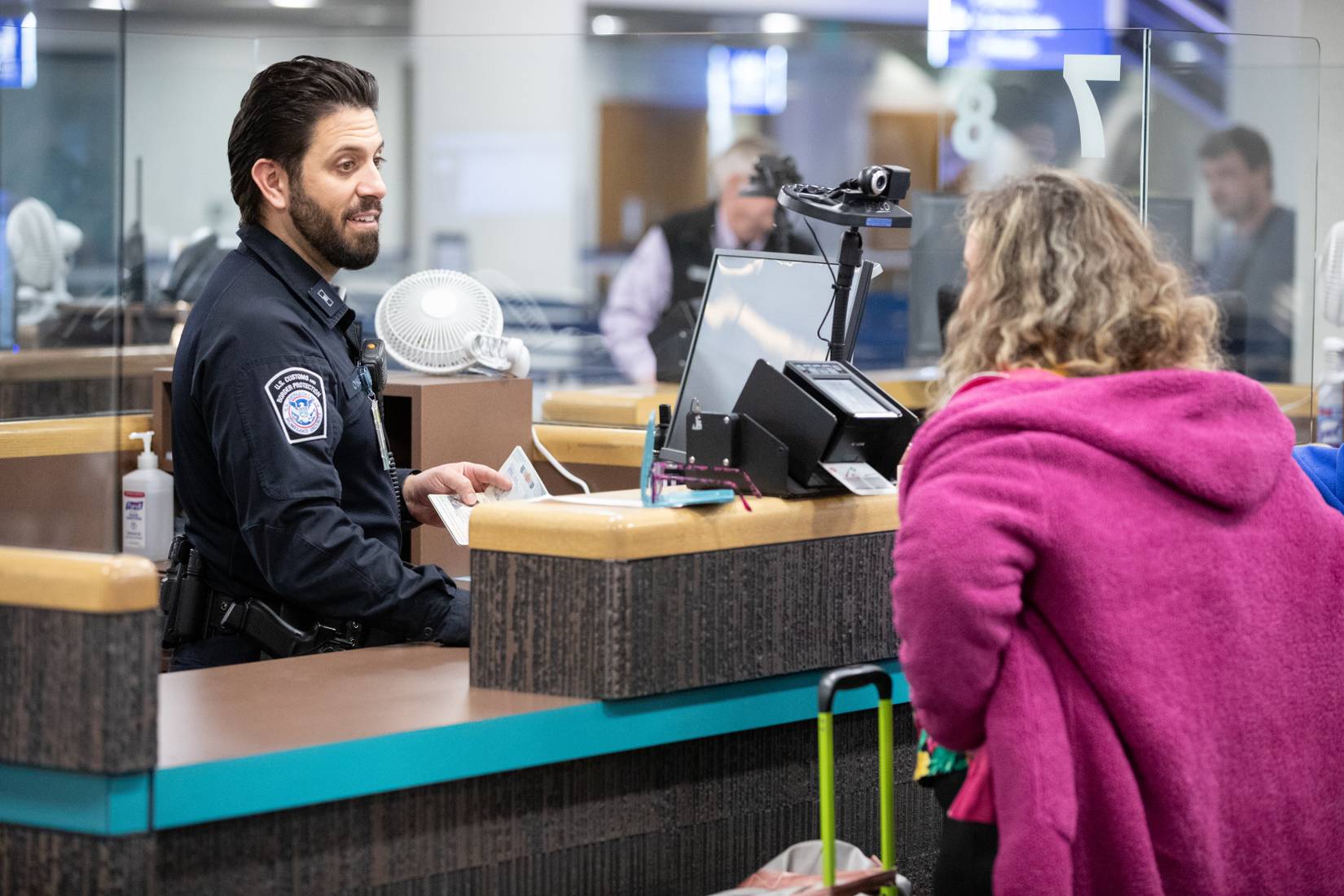 U.S. Customs and Border Protection (CBP) processing arriving international travelers