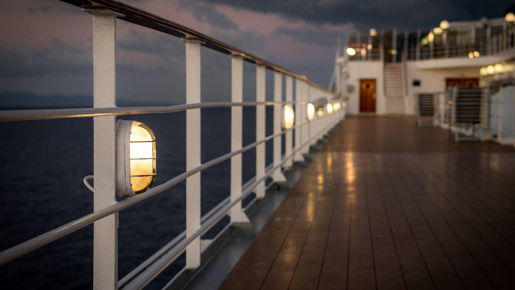 A deck of a cruise ship at night