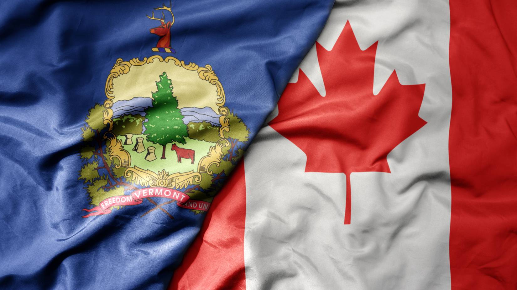 The flags of the State of Vermont and Canada