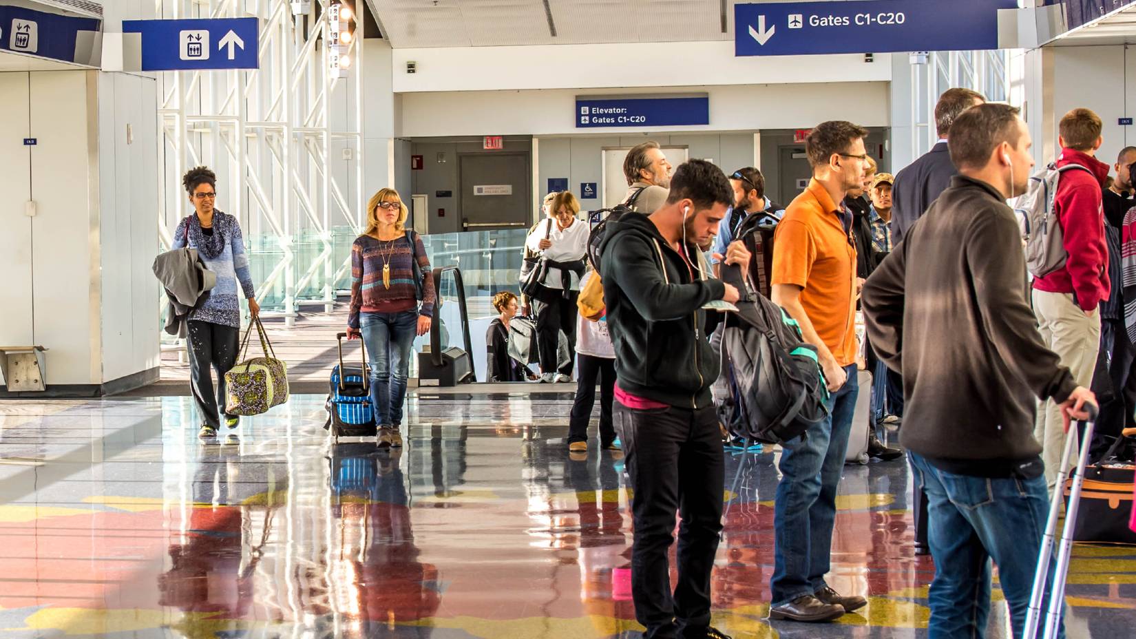 Passengers waiting at Dallas-Fort Worth International Airport (DFW), Dallas, Texas