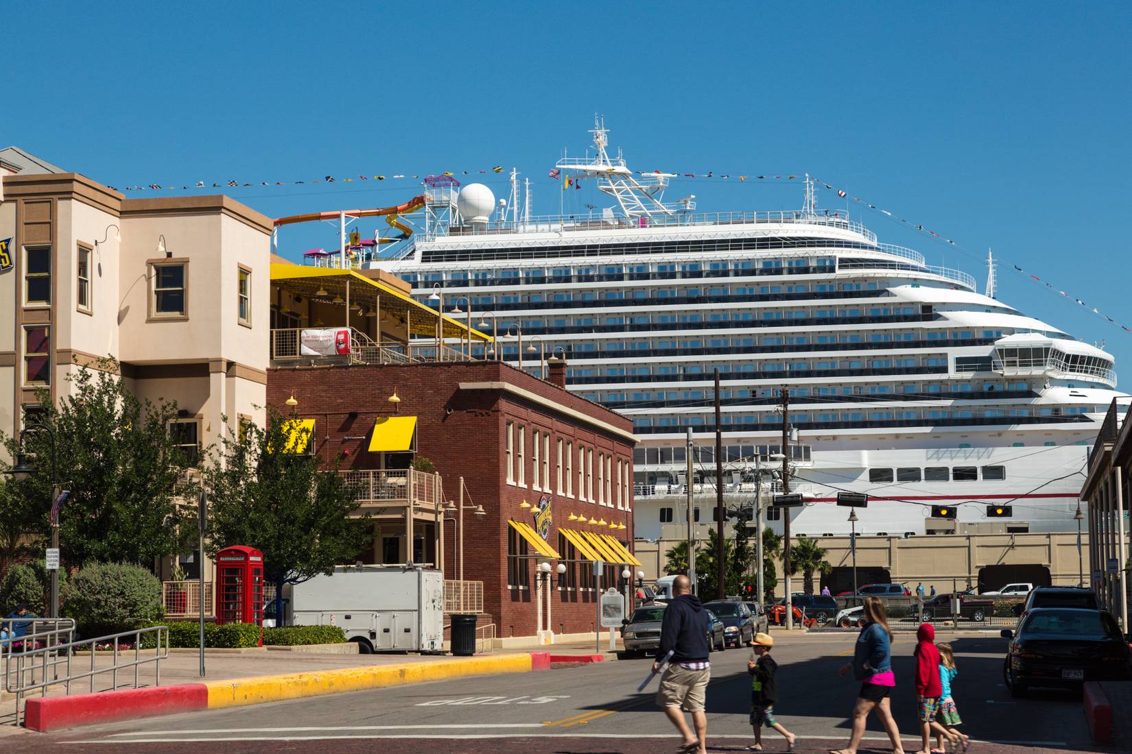 Carnival Magic cruise ship docked for turnaround on a sunny day at Galveston, Texas