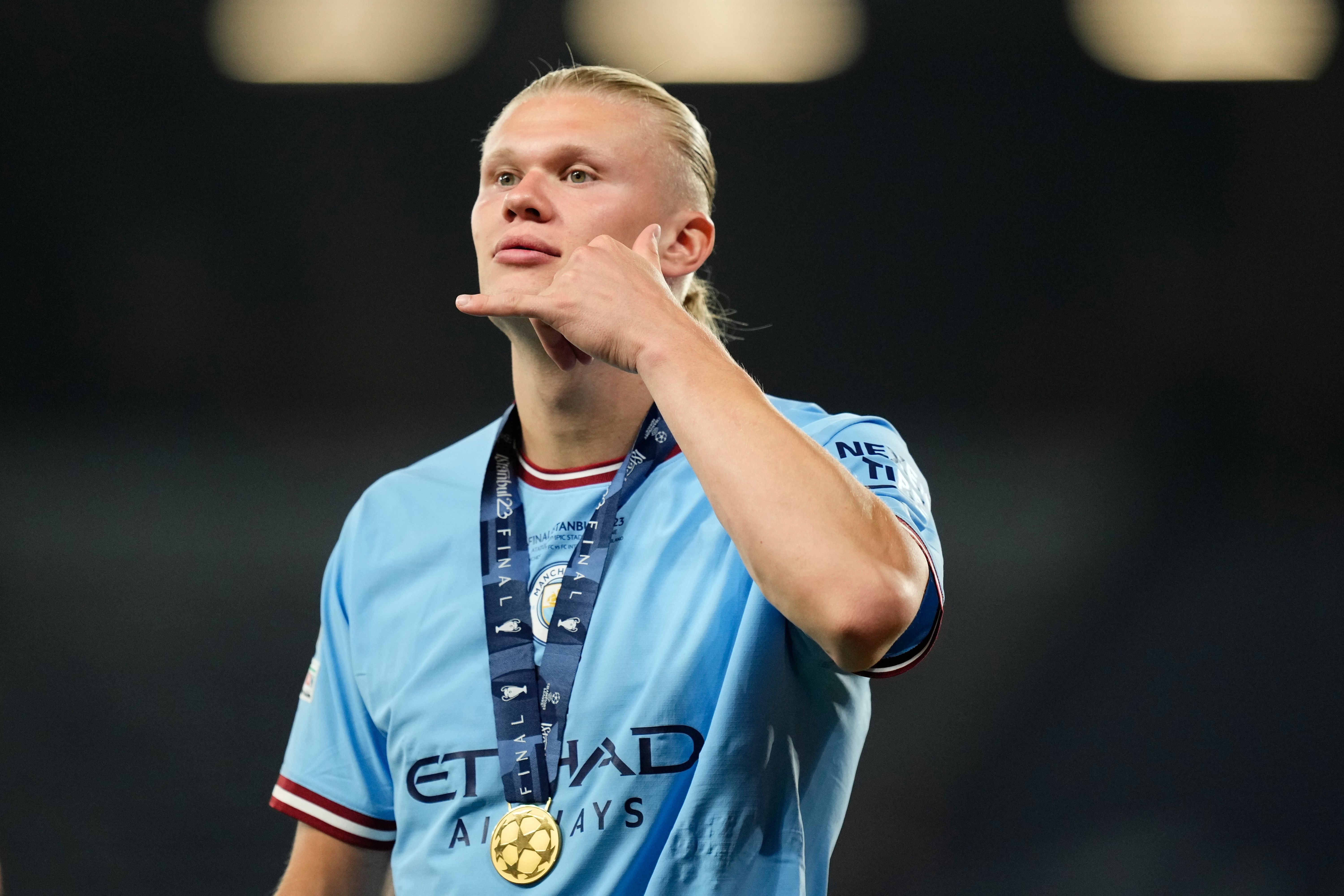 Erling Haaland of City and Norway celebrates winning the UEFA Champions League