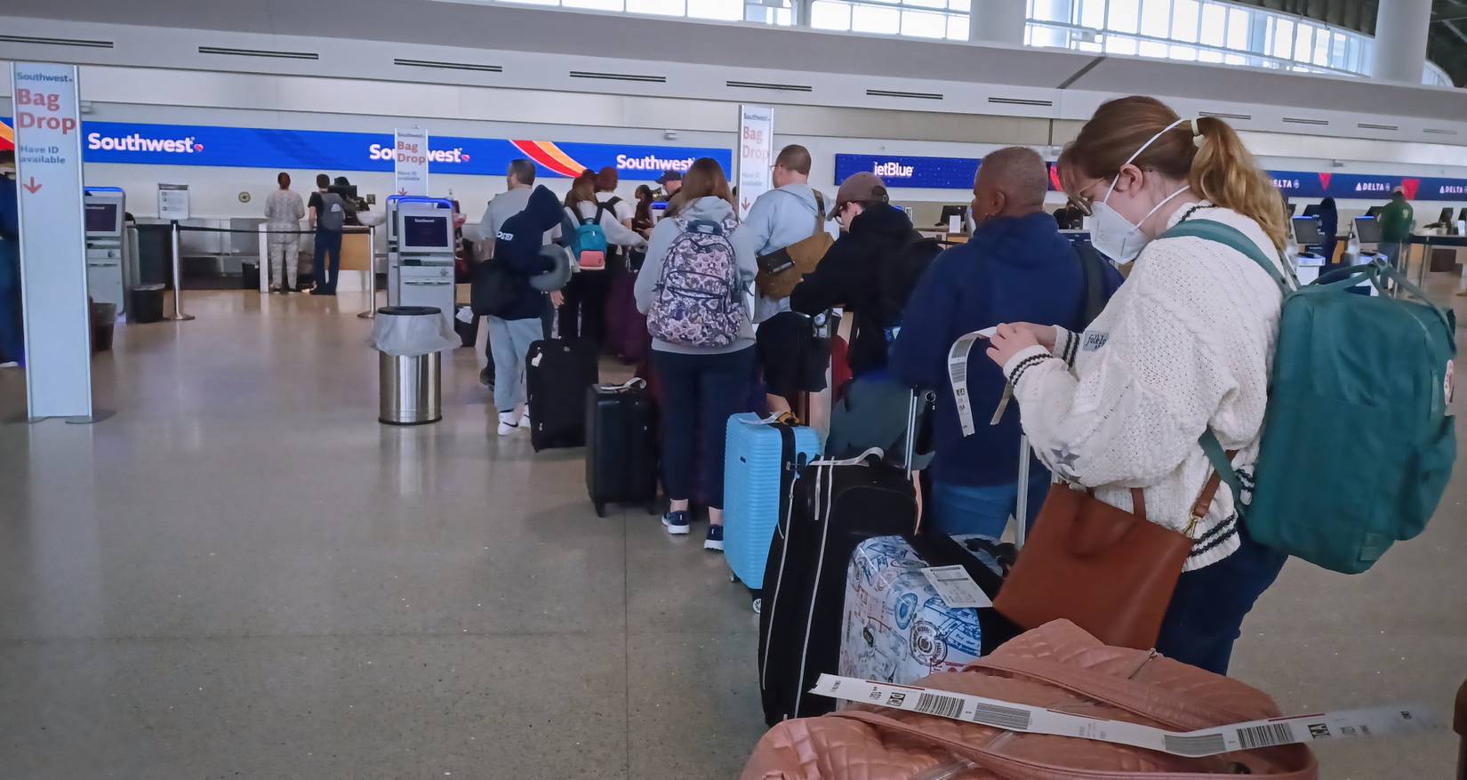 Southwest Airlines passengers waiting in line.