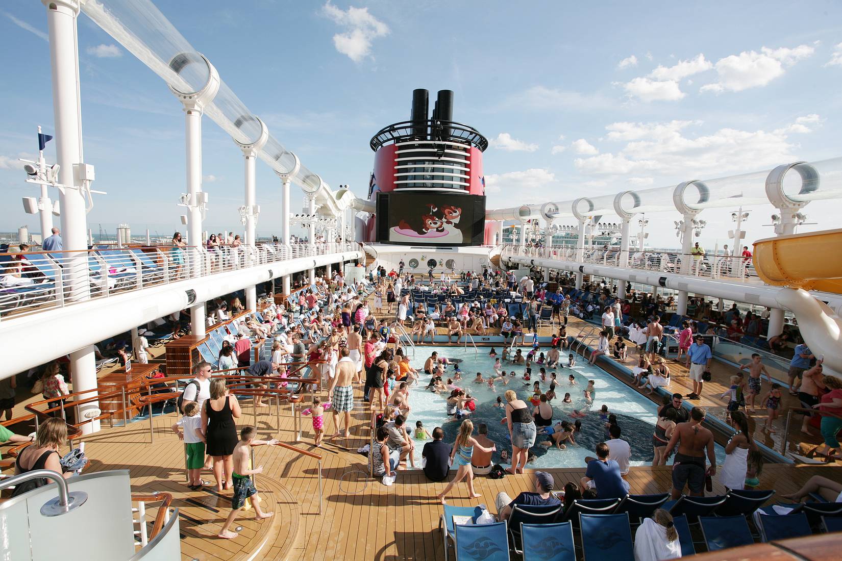 Top deck, people in the pool aboard Disney Dream