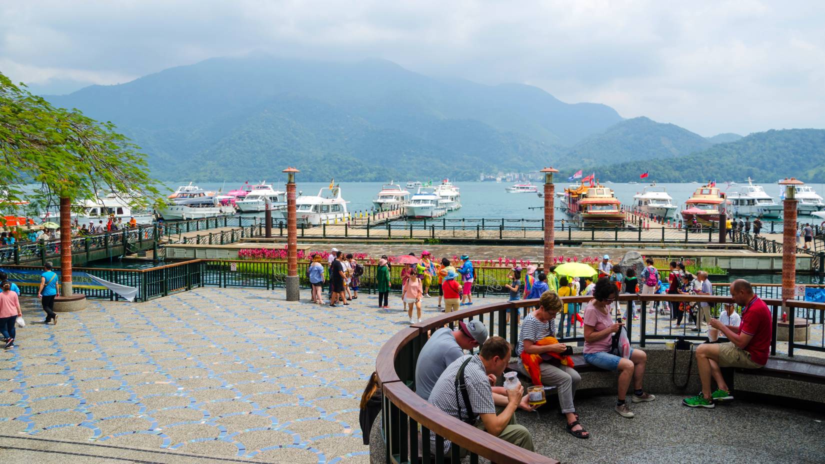 Tourists at the famous Sun Moon Lake in Yuchi Township, Nantou County, Taiwan