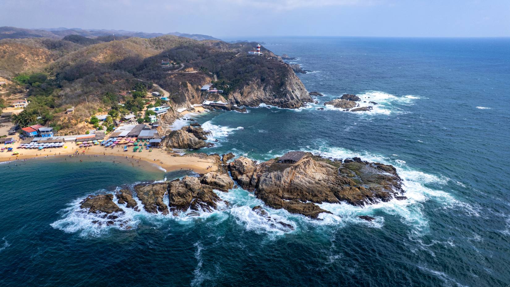 Aerial View of El Faro de Bucerías beach in the municipality of Aquila, Michoacán, Mexico