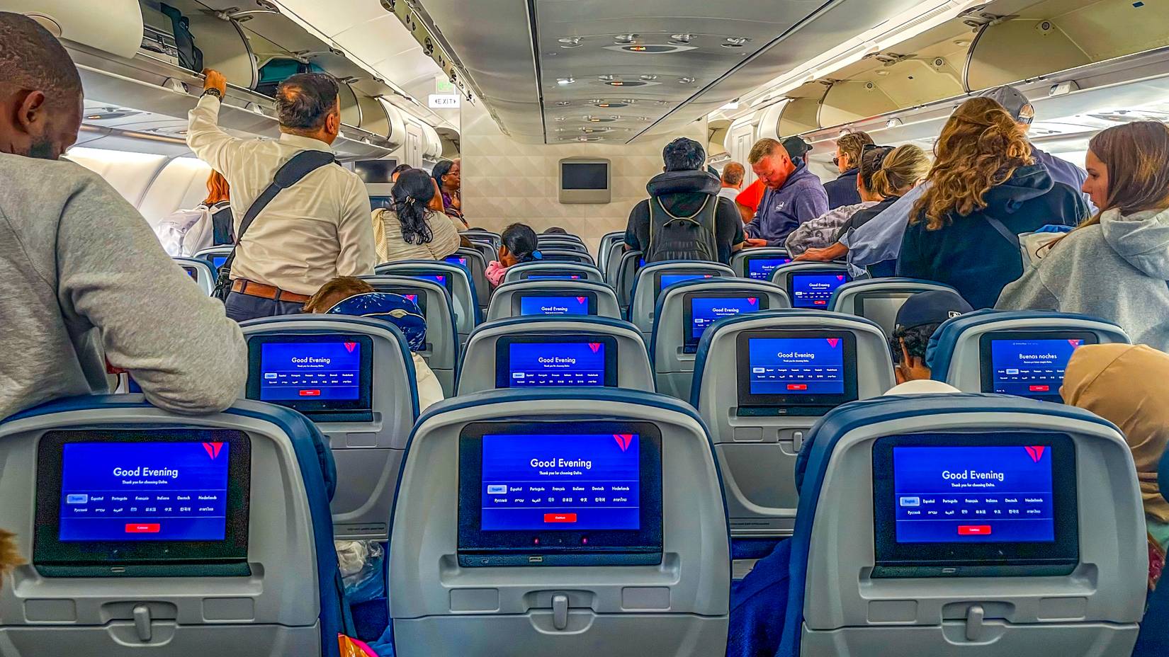 Passengers on a Delta Air Lines flight, preparing to disembark